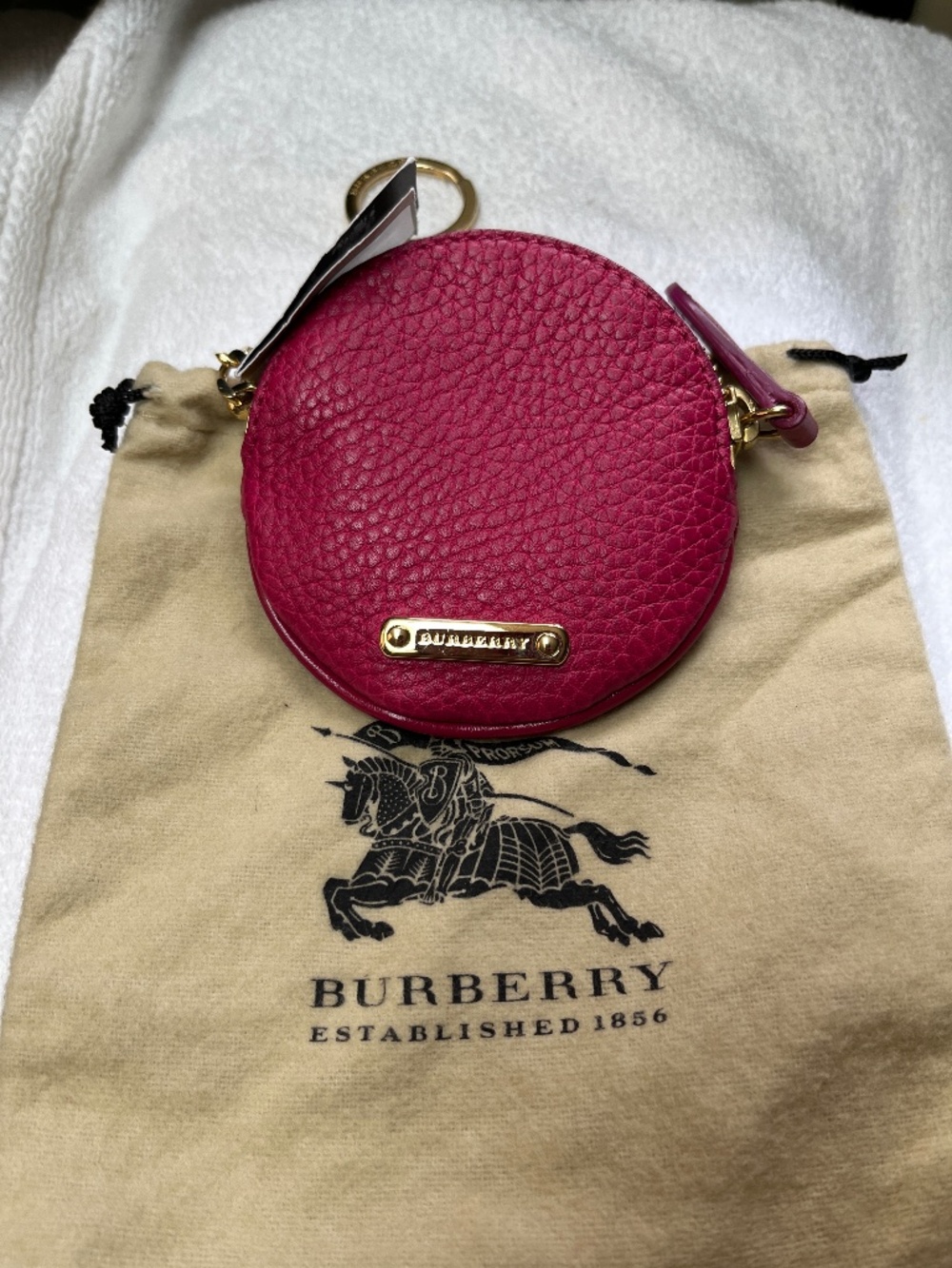 Brand new BURBERRY PINK coin pouch with tag never used with gold hardware